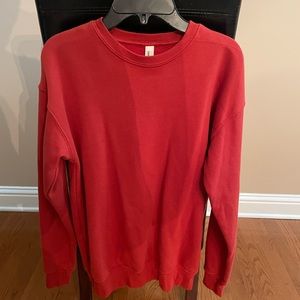 XS orange-red slim fit crewneck sweater